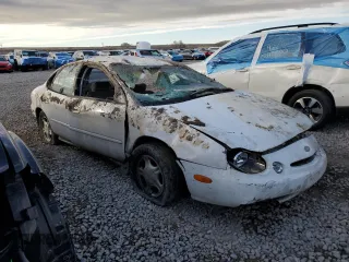 1997 Ford Taurus GL z VIN 1FALP52U1VG253340, wystawiony jako Copart lot #44081395 z przebiegiem 210 117 mil mil oraz Szkoda całkowita • Salvage title. Historia ofert i sprzedaży dostępna na DreamBid. Obrazek 4.
