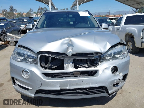 2014 BMW X5 sDrive35i with VIN 5UXKR2C54E0H31217, listed as a IAAI auction lot 41881021 with 163,492 mi miles. Bid and sale history available at carsss.com. Image 12.