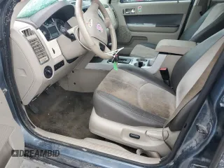 2010 Mercury Mariner Premier with VIN 4M2CN8HG3AKJ16128, listed as a Copart auction lot 58649895 with 157,798 mi miles and Salvage title. Bid and sale history available at DreamBid. Image 7.