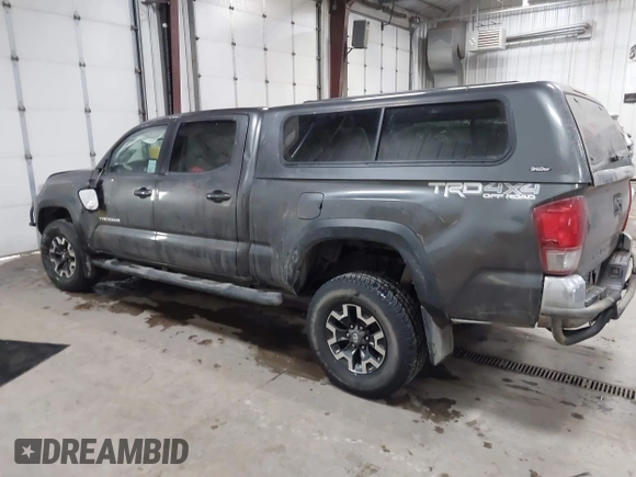 2016 Toyota Tacoma SR5 with VIN 3TMDZ5BNXGM009423, listed as a IAAI auction lot 41008068 with 107,426 mi miles and . Bid and sale history available at DreamBid. Image 14.
