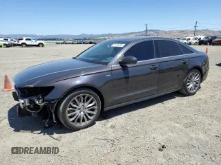 2014 Audi A6 with VIN WAUHMBFCXEN154713, listed as a Copart auction lot 55703285 with 73,461 mi miles and Salvage title. Bid and sale history available at DreamBid. Image 1.
