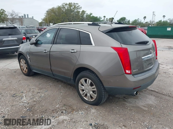 2012 Cadillac SRX Luxury Collection z VIN 3GYFNAE35CS509402, wystawiony jako IAAI lot #41765970 z przebiegiem 157 082 mil mil oraz . Historia ofert i sprzedaży dostępna na DreamBid. Obrazek 3.