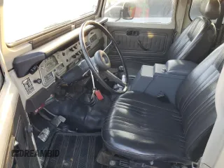 1977 Toyota Land Cruiser z VIN FJ40251338, wystawiony jako Copart lot #74954094 z przebiegiem 83 230 mil mil oraz Szkoda całkowita • Salvage title. Historia ofert i sprzedaży dostępna na DreamBid. Obrazek 7.