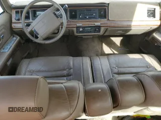 1991 Mercury Grand Marquis z VIN 2MECM75FXMX633893, wystawiony jako Copart lot #87439324 z przebiegiem 65 046 mil mil oraz Tytuł czysty. Historia ofert i sprzedaży dostępna na DreamBid. Obrazek 8.