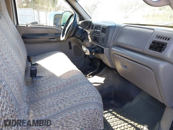 2001 Ford F-350 XL with VIN 1FTSF31L01EB57159, listed as a IAAI auction lot 41605363 with 87,526 mi miles and . Bid and sale history available at DreamBid. Image 5.