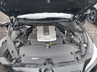 2015 Infiniti Q50 Premium with VIN JN1BV7AR1FM411864, listed as a IAAI auction lot 40800193 with 104,154 mi miles. Bid and sale history available at carsss.com. Image 10.