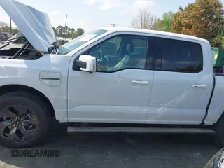 2023 Ford F-150 Lightning Pro z VIN 1FTVW1EV1PWG17610, wystawiony jako IAAI lot #41929636 z przebiegiem 44 428 mil mil oraz . Historia ofert i sprzedaży dostępna na DreamBid. Obrazek 15.