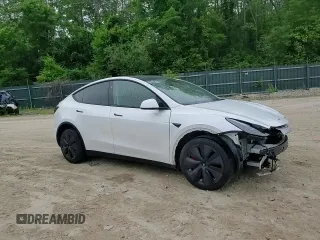 2024 Tesla Model Y Long Range с VIN 7SAYGDEE8RA266519, выставлен на аукционе Copart как лот 60899095 с пробегом Не указан миль и Списание • Salvage title. История ставок и продаж доступна на DreamBid. Изображение 14.