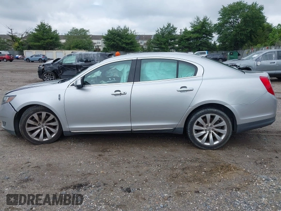 2013 Lincoln MKS with VIN 1LNHL9DK4DG606551, listed as a IAAI auction lot 42343140 with 70,424 mi miles and . Bid and sale history available at DreamBid. Image 14.