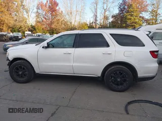 2015 Dodge Durango SXT with VIN 1C4RDJAG1FC745974, listed as a IAAI auction lot 41392820 with 124,861 mi miles and . Bid and sale history available at DreamBid. Image 15.