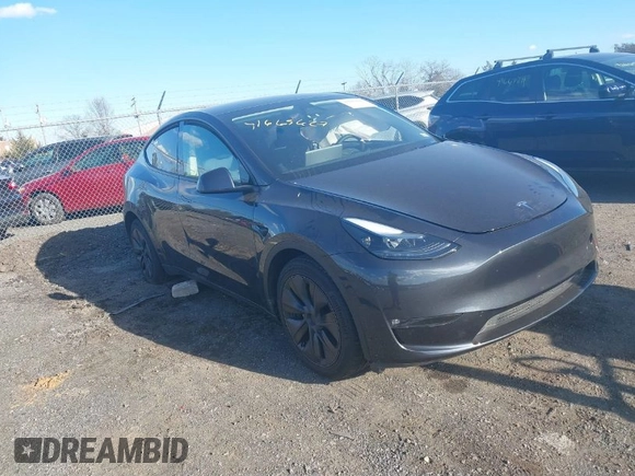 2024 Tesla Model Y Long Range with VIN 7SAYGAEEXRF212415, listed as a IAAI auction lot 41665627 with Not Provided miles and . Bid and sale history available at DreamBid. Image 1.