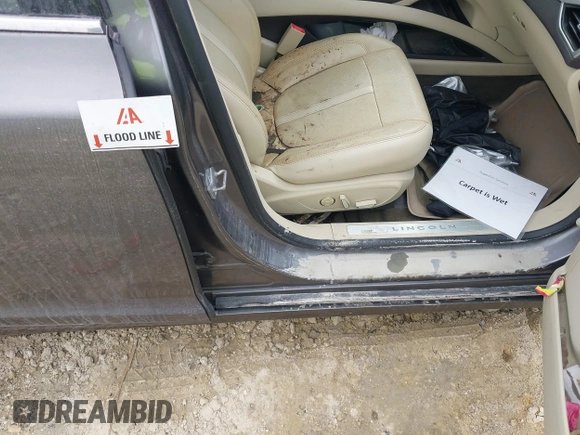 2014 Lincoln MKZ Hybrid with VIN 3LN6L2LU1ER814964, listed as a IAAI auction lot 40712613 with Not provided miles and . Bid and sale history available at DreamBid. Image 6.
