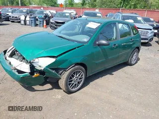 2002 Ford Focus ZX5 z VIN 3FAFP373X2R130965, wystawiony jako IAAI lot #42216638 z przebiegiem 59 236 mil mil oraz . Historia ofert i sprzedaży dostępna na DreamBid. Obrazek 17.