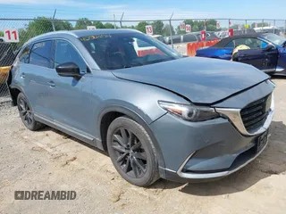 2021 Mazda CX-9 Carbon Edition with VIN JM3TCBDY7M0504462, listed as a IAAI auction lot 42590034 with 89,712 mi miles and . Bid and sale history available at DreamBid. Image 1.