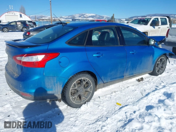 2014 Ford Focus SE with VIN 1FADP3F24EL421528, listed as a IAAI auction lot 41571243 with 90,553 mi miles and . Bid and sale history available at DreamBid. Image 4.