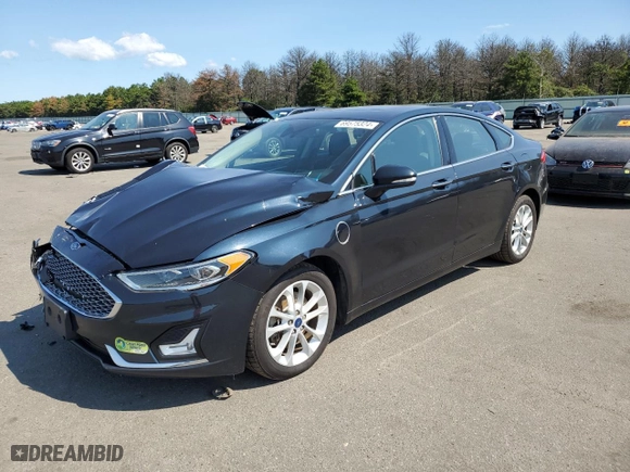 2020 Ford Fusion Plug-In Hybrid Titanium with VIN 3FA6P0SUXLR101997, listed as a Copart auction lot 69575324 with 74,121 mi miles and Salvage Title. Bid and sale history available at carsss.com. Image 1.