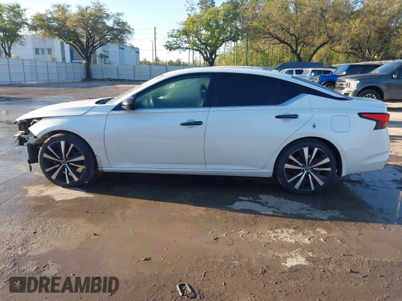 2020 Nissan Altima 2.5 SR with VIN 1N4BL4CV6LC261124, listed as a IAAI auction lot 41771341 with 102,289 mi miles. Bid and sale history available at carsss.com. Image 15.