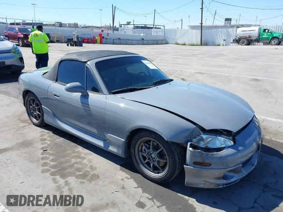 2003 Mazda MX-5 Miata Cloth with VIN JM1NB353930309670, listed as a IAAI auction lot 42234586 with 220,979 mi miles and . Bid and sale history available at DreamBid. Image 1.