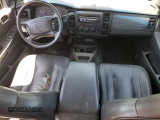 2001 Dodge Dakota Sport z VIN 1B7HG2AN61S316996, wystawiony jako Copart lot #58677535 z przebiegiem 164 628 mil mil oraz Tytuł czysty. Historia ofert i sprzedaży dostępna na DreamBid. Obrazek 8.