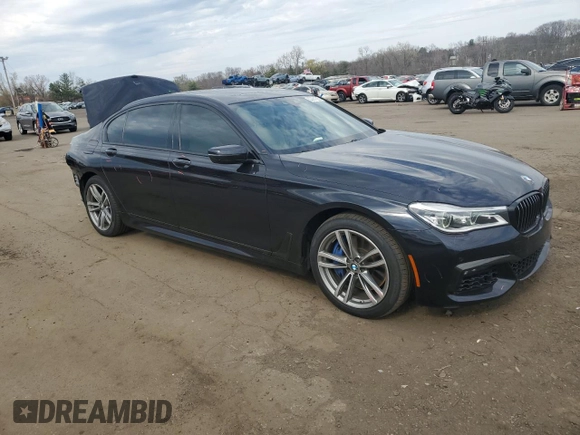 2019 BMW 7 Series 750i xDrive with VIN WBA7F2C58KB239624, listed as a Copart auction lot 53781025 with 87,894 mi miles and Salvage title. Bid and sale history available at DreamBid. Image 4.