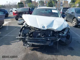 2014 BMW X1 xDrive28i with VIN WBAVL1C52EVY23658, listed as a IAAI auction lot 41153436 with 26,791 mi miles. Bid and sale history available at carsss.com. Image 13.