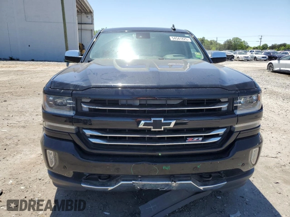 2017 Chevrolet Silverado 1500 LTZ with VIN 1GCVKSEC5HZ149848, listed as a Copart auction lot 54541825 with 104,291 mi miles and Salvage Title. Bid and sale history available at DreamBid. Image 5.