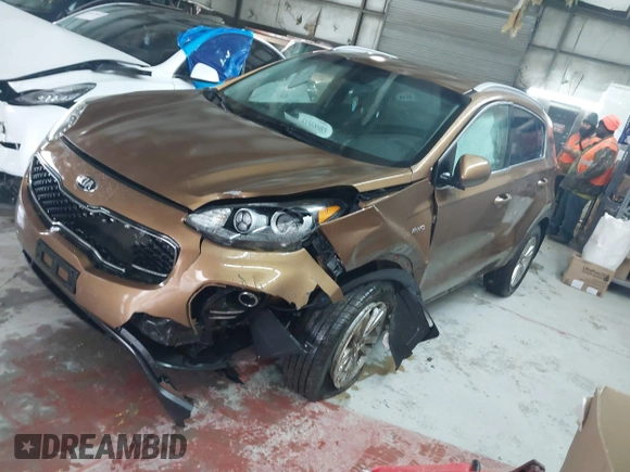 2018 Kia Sportage LX with VIN KNDPMCACXJ7446520, listed as a IAAI auction lot 41568985 with 79,601 mi miles and . Bid and sale history available at DreamBid. Image 2.