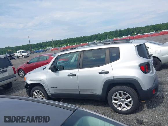2018 Jeep Renegade Sport with VIN ZACCJBAB3JPJ41711, listed as a IAAI auction lot 42742310 with 76,773 mi miles and . Bid and sale history available at DreamBid. Image 14.
