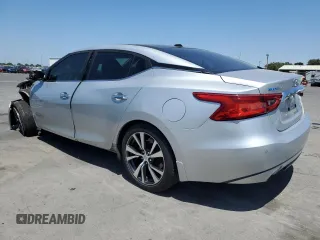 2016 Nissan Maxima SL with VIN 1N4AA6AP2GC390257, listed as a Copart auction lot 60289225 with 149,219 mi miles and Salvage title. Bid and sale history available at DreamBid. Image 2.