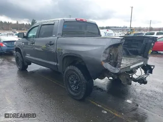 2018 Toyota Tundra 4WD SR5 with VIN 5TFDY5F14JX768998, listed as a IAAI auction lot 41593799 with 146,673 mi miles. Bid and sale history available at carsss.com. Image 3.