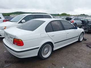 2000 BMW 5 Series 528i z VIN WBADM6341YGU07316, wystawiony jako IAAI lot #42436386 z przebiegiem Nie podano mil oraz . Historia ofert i sprzedaży dostępna na DreamBid. Obrazek 4.