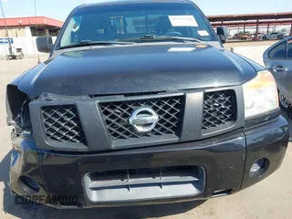 2006 Nissan Titan SE with VIN 1N6AA06A26N565554, listed as a IAAI auction lot 40485704 with 154,559 mi miles and . Bid and sale history available at DreamBid. Image 12.