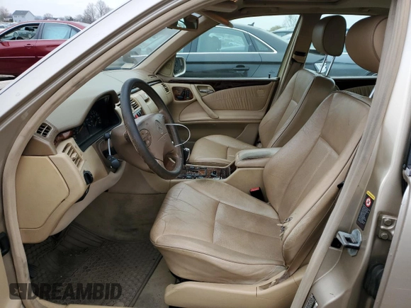 2002 Mercedes-Benz E-Class with VIN WDBJF82J52X062915, listed as a Copart auction lot 48284604 with 150,227 mi miles and Salvage Title. Bid and sale history available at carsss.com. Image 7.