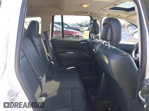 2015 Jeep Compass Latitude with VIN 1C4NJDEB7FD120738, listed as a IAAI auction lot 41878045 with 128,393 mi miles. Bid and sale history available at carsss.com. Image 8.