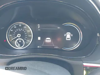 2025 Genesis GV70 2.5T z VIN KMUMADTB3SU178075, wystawiony jako IAAI lot #40492029 z przebiegiem 4 399 mil mil oraz . Historia ofert i sprzedaży dostępna na DreamBid. Obrazek 7.