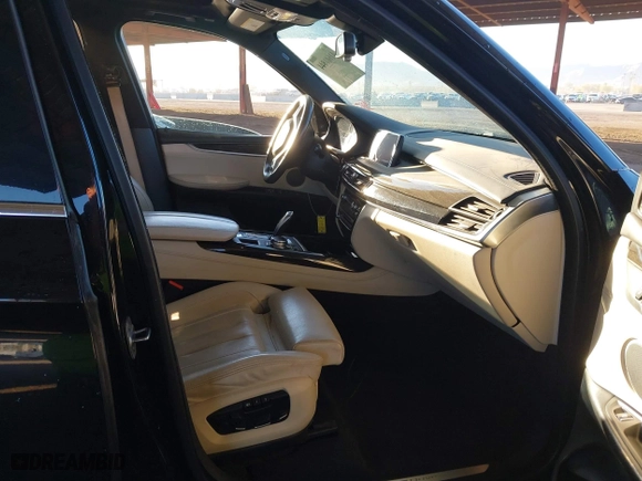 2017 BMW X5 xDrive40e iPerformance with VIN 5UXKT0C35H0V97078, listed as a IAAI auction lot 41601844 with 85,597 mi miles. Bid and sale history available at carsss.com. Image 5.