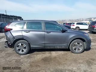 2020 Honda CR-V LX with VIN 2HKRW2H20LH607675, listed as a IAAI auction lot 41645896 with 64,973 mi miles. Bid and sale history available at carsss.com. Image 13.