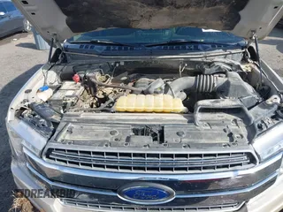 2018 Ford F-150 XL with VIN 1FTEW1E50JKC01823, listed as a IAAI auction lot 41824169 with 130,034 mi miles. Bid and sale history available at carsss.com. Image 10.