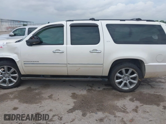 2013 Chevrolet Suburban LTZ with VIN 1GNSCKE00DR209381, listed as a IAAI auction lot 42469271 with Not provided miles and . Bid and sale history available at DreamBid. Image 14.