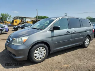 2007 Honda Odyssey LX z VIN 5FNRL38257B011710, wystawiony jako Copart lot #61163265 z przebiegiem 196 575 mil mil oraz Czysty tytuł • Clean title. Historia ofert i sprzedaży dostępna na DreamBid. Obrazek 1.