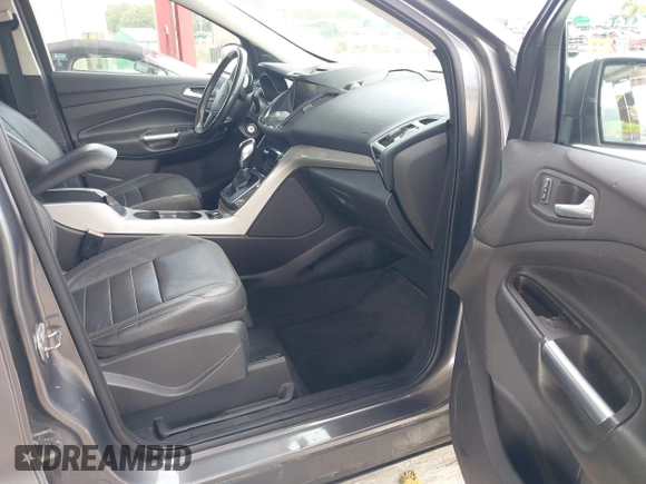 2013 Ford Escape SEL with VIN 1FMCU0HX8DUB61208, listed as a IAAI auction lot 42575283 with 140,330 mi miles and . Bid and sale history available at DreamBid. Image 5.