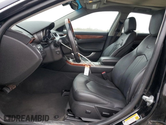 2013 Cadillac CTS Premium with VIN 1G6DP5E37D0143159, listed as a Copart auction lot 85570024 with 102,743 mi miles and Salvage Title. Bid and sale history available at DreamBid. Image 7.