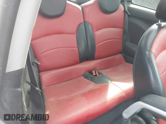 2009 MINI Hardtop S with VIN WMWMF73569TW87929, listed as a IAAI auction lot 42057214 with 164,922 mi miles and . Bid and sale history available at DreamBid. Image 8.