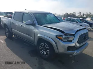 2021 Toyota Tacoma SR5 with VIN 5TFAZ5CN1MX112995, listed as a IAAI auction lot 41868208 with 41,921 mi miles and . Bid and sale history available at DreamBid. Image 1.