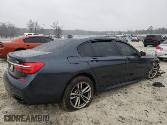2016 BMW 7 Series 750i xDrive with VIN WBA7F2C54GG415272, listed as a Copart auction lot 86573664 with Not provided miles and Salvage title. Bid and sale history available at DreamBid. Image 3.