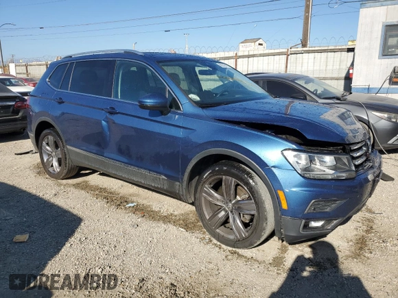 2020 Volkswagen Tiguan SE z VIN 3VV3B7AXXLM150387, wystawiony jako Copart lot #50516415 z przebiegiem 31 419 mil mil oraz Szkody całkowita. Historia ofert i sprzedaży dostępna na DreamBid. Obrazek 4.