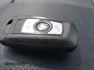 2014 BMW 3 Series 328i with VIN WBA3A5C5XEJ463938, listed as a IAAI auction lot 42103330 with 194,263 mi miles and . Bid and sale history available at DreamBid. Image 11.