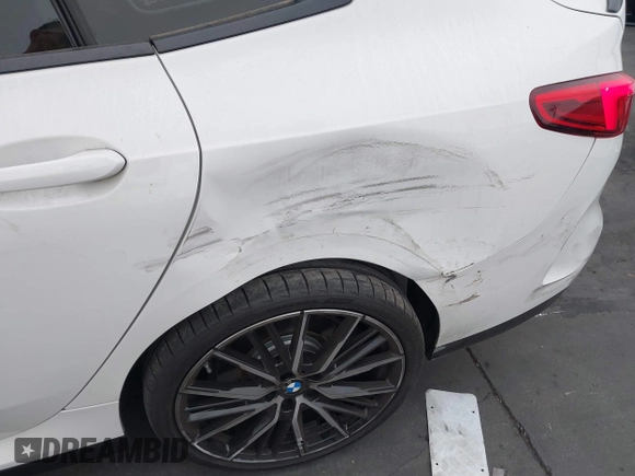 2022 BMW 2 Series M235i xDrive with VIN WBA13AL0XN7J95517, listed as a IAAI auction lot 42682823 with 16,069 mi miles and . Bid and sale history available at DreamBid. Image 12.
