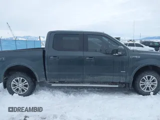 2015 Ford F-150 XLT with VIN 1FTEW1EP6FFB48630, listed as a IAAI auction lot 41597442 with 128,428 mi miles. Bid and sale history available at carsss.com. Image 13.