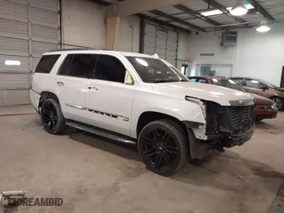 2018 Cadillac Escalade Premium Luxury with VIN 1GYS3CKJ4JR140888, listed as a IAAI auction lot 41416277 with 132,944 mi miles. Bid and sale history available at carsss.com. Image 1.